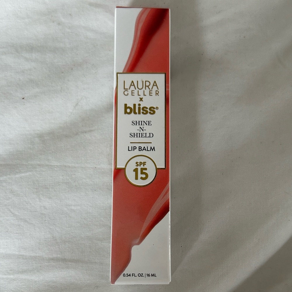 Laura Geller, Bliss shine and shield lip balm. New